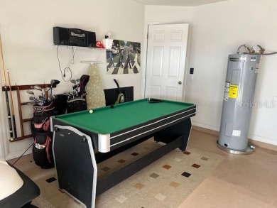 This 4 bedroom 3 bath pool home situated on cul-de-sac in the on Southern Dunes Golf and Country Club in Florida - for sale on GolfHomes.com, golf home, golf lot
