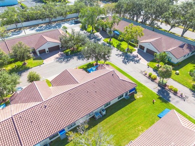 Located in The Mainlands of Tamarac by the Gulf - a premier 55+ on Mainlands Golf Club in Florida - for sale on GolfHomes.com, golf home, golf lot