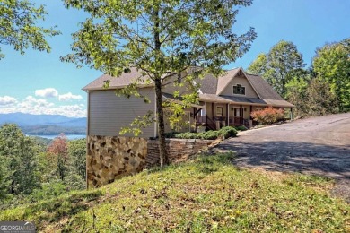 Indulge in breathtaking views from the moment you step foot in on Mountain Harbour Golf Club in North Carolina - for sale on GolfHomes.com, golf home, golf lot