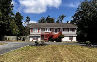 Multi-Generational or Summer Vacation Home. This raised Rancher on Atlantic City Country Club in New Jersey - for sale on GolfHomes.com, golf home, golf lot