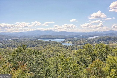 Indulge in breathtaking views from the moment you step foot in on Mountain Harbour Golf Club in North Carolina - for sale on GolfHomes.com, golf home, golf lot