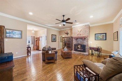 Get your golf clubs ready and settle into refined comfort just on Ridgewood Country Club in Texas - for sale on GolfHomes.com, golf home, golf lot