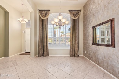 Start your new chapter in this stunning single-story home in on Arizona Traditions Golf Club in Arizona - for sale on GolfHomes.com, golf home, golf lot
