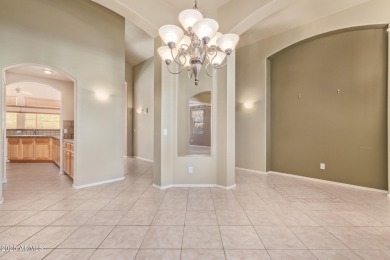 Start your new chapter in this stunning single-story home in on Arizona Traditions Golf Club in Arizona - for sale on GolfHomes.com, golf home, golf lot