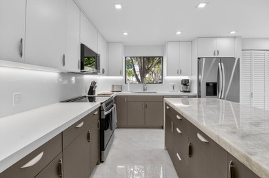 First Floor beautiful, totally renovated condo offering stunning on Gleneagles Golf and Country Club in Florida - for sale on GolfHomes.com, golf home, golf lot