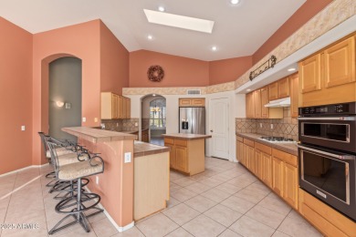 Start your new chapter in this stunning single-story home in on Arizona Traditions Golf Club in Arizona - for sale on GolfHomes.com, golf home, golf lot