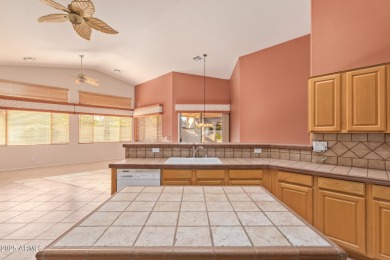 Start your new chapter in this stunning single-story home in on Arizona Traditions Golf Club in Arizona - for sale on GolfHomes.com, golf home, golf lot