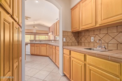 Start your new chapter in this stunning single-story home in on Arizona Traditions Golf Club in Arizona - for sale on GolfHomes.com, golf home, golf lot