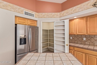 Start your new chapter in this stunning single-story home in on Arizona Traditions Golf Club in Arizona - for sale on GolfHomes.com, golf home, golf lot