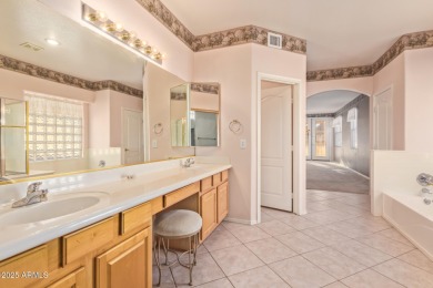 Start your new chapter in this stunning single-story home in on Arizona Traditions Golf Club in Arizona - for sale on GolfHomes.com, golf home, golf lot