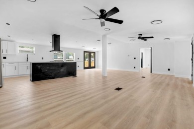 Step inside this beautifully reimagined manufactured home on Jake Gaither Golf Course in Florida - for sale on GolfHomes.com, golf home, golf lot