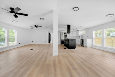 Step inside this beautifully reimagined manufactured home on Jake Gaither Golf Course in Florida - for sale on GolfHomes.com, golf home, golf lot