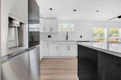 Step inside this beautifully reimagined manufactured home on Jake Gaither Golf Course in Florida - for sale on GolfHomes.com, golf home, golf lot