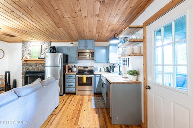 Charming Cabin in Laurel Valley Community - Ideal for Investment on Laurel Valley Golf Course in Tennessee - for sale on GolfHomes.com, golf home, golf lot