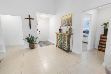 Step into Deer Creek's most sought-after villa--where modern on Deer Creek Golf Club in Florida - for sale on GolfHomes.com, golf home, golf lot