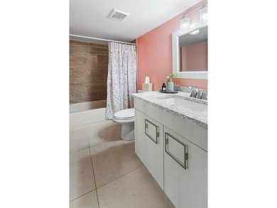 Step into Deer Creek's most sought-after villa--where modern on Deer Creek Golf Club in Florida - for sale on GolfHomes.com, golf home, golf lot