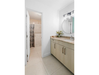 Step into Deer Creek's most sought-after villa--where modern on Deer Creek Golf Club in Florida - for sale on GolfHomes.com, golf home, golf lot