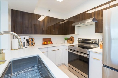 3rd floor 2-bedroom, 2 bath Crystal Bay condo overlooking the on Feather Sound Country Club in Florida - for sale on GolfHomes.com, golf home, golf lot