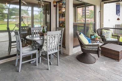 Step into Deer Creek's most sought-after villa--where modern on Deer Creek Golf Club in Florida - for sale on GolfHomes.com, golf home, golf lot