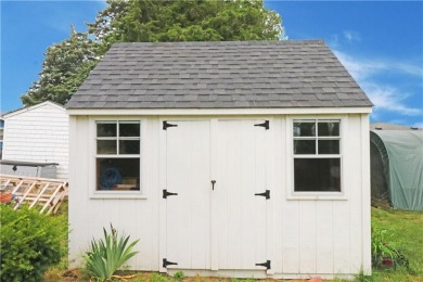 Colonial styled home with 3 beds & 3 baths including a water on Montaup Country Club in Rhode Island - for sale on GolfHomes.com, golf home, golf lot