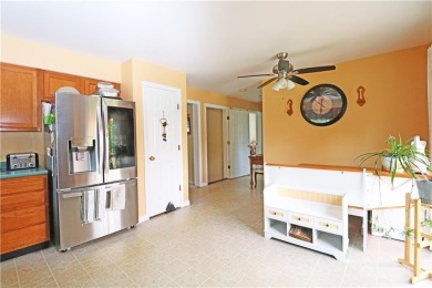 Colonial styled home with 3 beds & 3 baths including a water on Montaup Country Club in Rhode Island - for sale on GolfHomes.com, golf home, golf lot