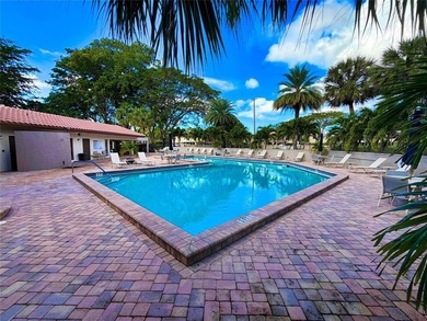 Step into Deer Creek's most sought-after villa--where modern on Deer Creek Golf Club in Florida - for sale on GolfHomes.com, golf home, golf lot