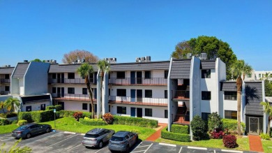 Welcome to this charming first-floor condo located in the on Fountains Golf and Country Club in Florida - for sale on GolfHomes.com, golf home, golf lot