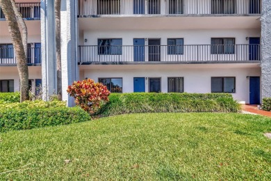 Welcome to this charming first-floor condo located in the on Fountains Golf and Country Club in Florida - for sale on GolfHomes.com, golf home, golf lot