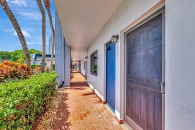 Welcome to this charming first-floor condo located in the on Fountains Golf and Country Club in Florida - for sale on GolfHomes.com, golf home, golf lot