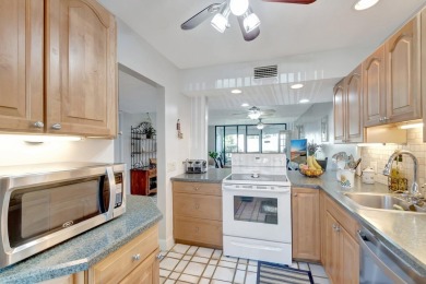 Welcome to this charming first-floor condo located in the on Fountains Golf and Country Club in Florida - for sale on GolfHomes.com, golf home, golf lot