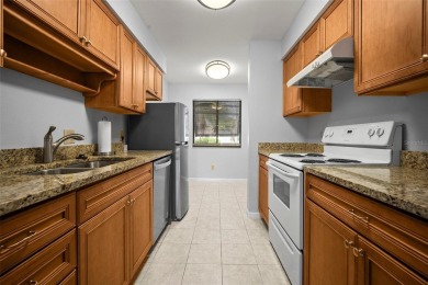 Welcome to this beautifully maintained 2-bedroom, 2-bath ground on The Meadows Golf and Country Club in Florida - for sale on GolfHomes.com, golf home, golf lot