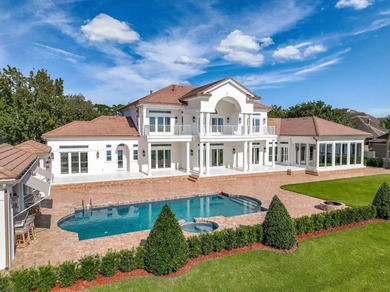 Welcome to 6 Sunset Beach Place, an extraordinary bay front on Golf Club at Bluewater Bay Resort in Florida - for sale on GolfHomes.com, golf home, golf lot