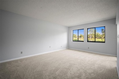 Welcome to this beautifully maintained 2-bedroom, 2-bath ground on The Meadows Golf and Country Club in Florida - for sale on GolfHomes.com, golf home, golf lot