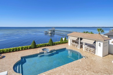 Welcome to 6 Sunset Beach Place, an extraordinary bay front on Golf Club at Bluewater Bay Resort in Florida - for sale on GolfHomes.com, golf home, golf lot