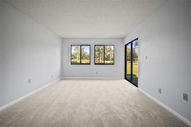 Welcome to this beautifully maintained 2-bedroom, 2-bath ground on The Meadows Golf and Country Club in Florida - for sale on GolfHomes.com, golf home, golf lot