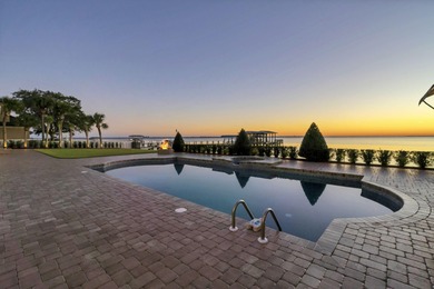 Welcome to 6 Sunset Beach Place, an extraordinary bay front on Golf Club at Bluewater Bay Resort in Florida - for sale on GolfHomes.com, golf home, golf lot