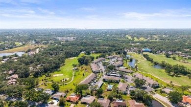 Welcome to this beautifully maintained 2-bedroom, 2-bath ground on The Meadows Golf and Country Club in Florida - for sale on GolfHomes.com, golf home, golf lot