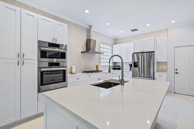 Beautifully renovated and filled with natural light, this bright on Ibis Golf and Country Club in Florida - for sale on GolfHomes.com, golf home, golf lot