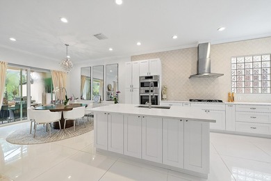 Beautifully renovated and filled with natural light, this bright on Ibis Golf and Country Club in Florida - for sale on GolfHomes.com, golf home, golf lot