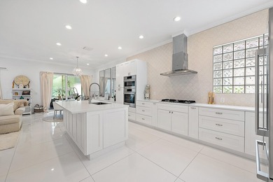 Beautifully renovated and filled with natural light, this bright on Ibis Golf and Country Club in Florida - for sale on GolfHomes.com, golf home, golf lot