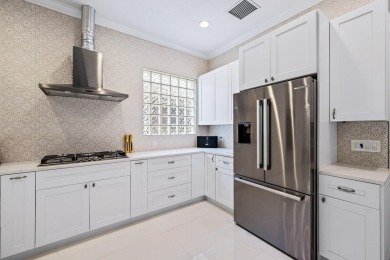 Beautifully renovated and filled with natural light, this bright on Ibis Golf and Country Club in Florida - for sale on GolfHomes.com, golf home, golf lot