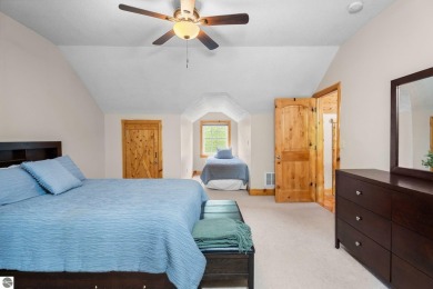 Stunning, custom-built log home overlooking the 16th tee & on Cedar River Golf Course in Michigan - for sale on GolfHomes.com, golf home, golf lot