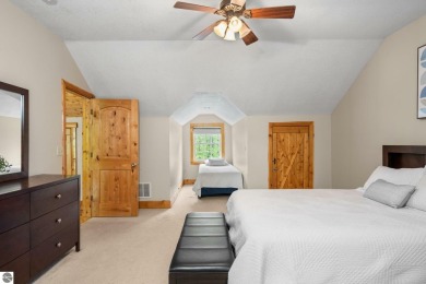 Stunning, custom-built log home overlooking the 16th tee & on Cedar River Golf Course in Michigan - for sale on GolfHomes.com, golf home, golf lot
