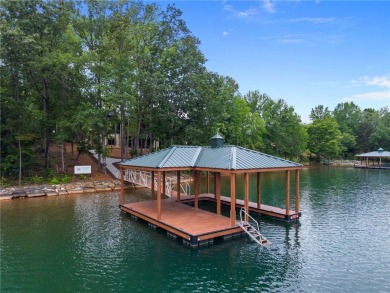 Welcome to an extraordinary lakefront retreat in the prestigious on The Cliffs At Keowee Springs in South Carolina - for sale on GolfHomes.com, golf home, golf lot