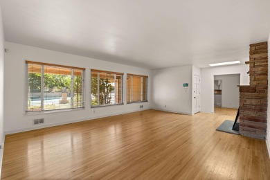 OWNED SOLAR PANELS, MINUTES AWAY FROM UNM, AND UPDATED! Welcome on North Course - University of New Mexico  in New Mexico - for sale on GolfHomes.com, golf home, golf lot