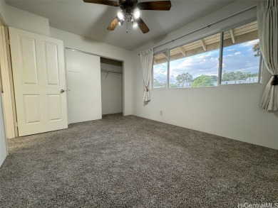 Rarely available 2-bedroom, 2 bath townhome with 2 lanais and 2 on Moanalua Golf Club in Hawaii - for sale on GolfHomes.com, golf home, golf lot