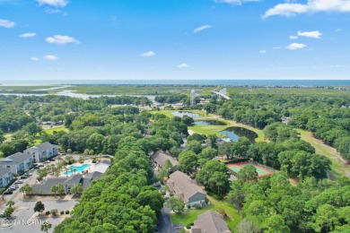 This unique Sunset Beach property in Sea Trail offers endless on Oyster Bay Golf Links in North Carolina - for sale on GolfHomes.com, golf home, golf lot