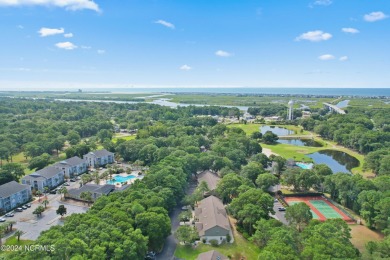 This unique Sunset Beach property in Sea Trail offers endless on Oyster Bay Golf Links in North Carolina - for sale on GolfHomes.com, golf home, golf lot