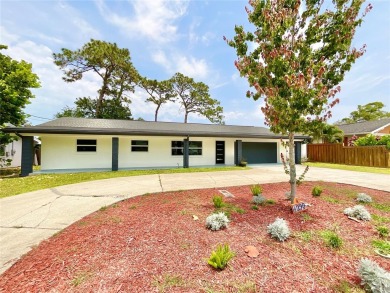 Welcome to your dream home in the heart of Dunedin, one of on The Dunedin Country Club in Florida - for sale on GolfHomes.com, golf home, golf lot