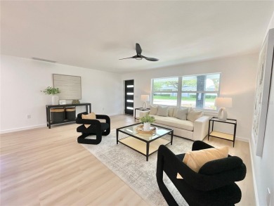 Welcome to your dream home in the heart of Dunedin, one of on The Dunedin Country Club in Florida - for sale on GolfHomes.com, golf home, golf lot